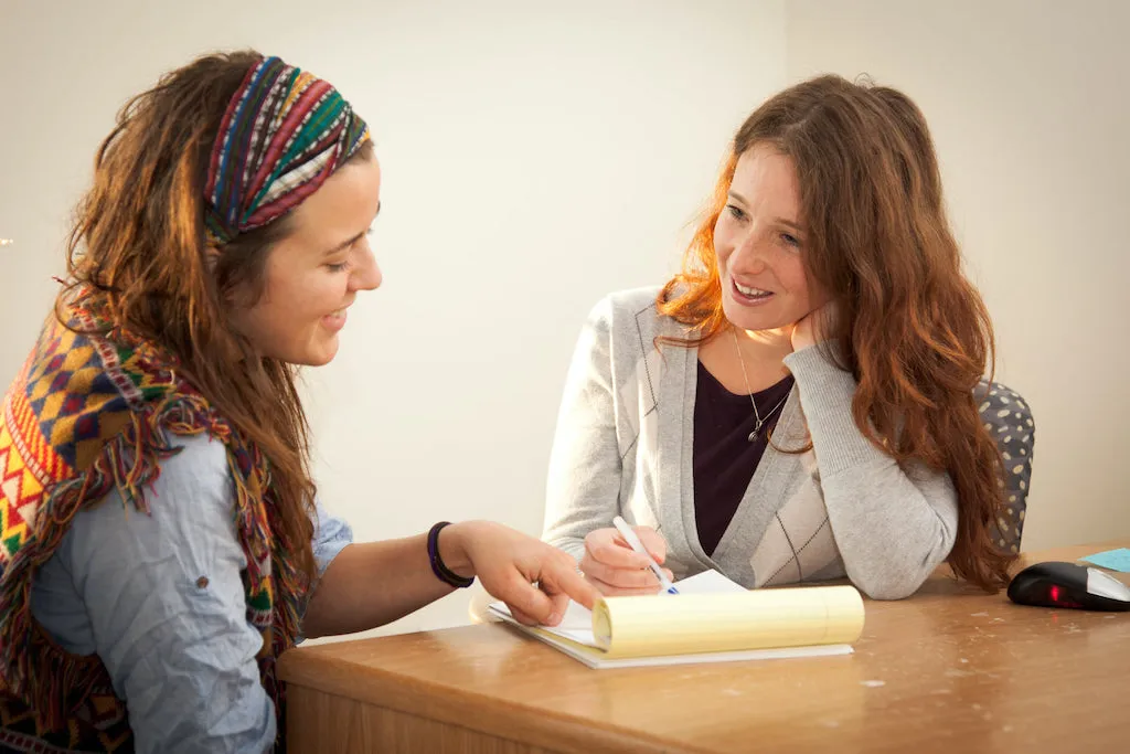 Two students in a classroom